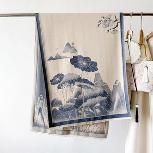 Detailed view of elegant lotus landscape print on soft cashmere-like beige shawl scarf
