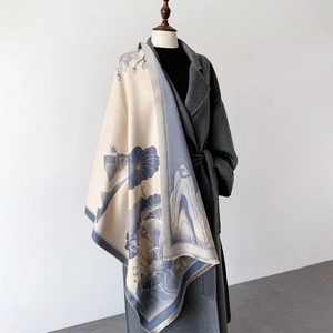 Elegant beige and blue lotus cashmere-like shawl scarf over a wool coat for women