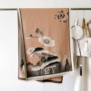Detail of elegant lotus pattern scarf with fringe, shown in a classic oriental setting