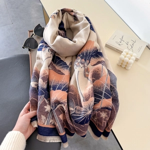 Detail of vintage lotus print shawl scarf with fine fringe trim and soft cashmere texture