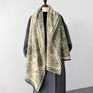 Elegant off-white cashmere-feel shawl scarf with sage green floral patterns and tassels