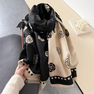 Classic black and white knit camellia shawl with elegant long fringes for women