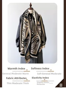 Detail of leaf print scarf showing thick fabric texture and soft fringe tassels