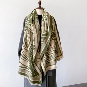 Thick warm winter scarf with dark green palm leaf pattern and fringes for women