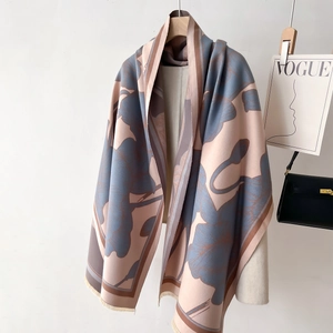 Thick winter shawl scarf with floral patterns, tassels and a soft luxurious feel