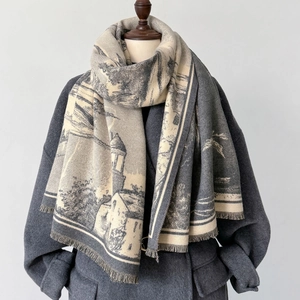 Vintage landscape oil painting cashmere scarf with fringe edges draped over an overcoat