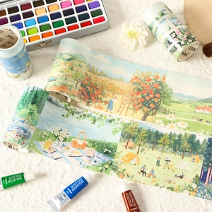 Artistic washi tape with scenic life illustrations and gouache paint tubes for DIY crafting