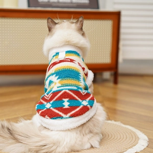 Detail of pet fleece vest featuring geometric ethnic pattern and D-ring leash attachment