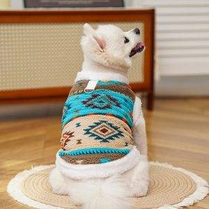 Detail of pet fleece vest with ethnic pattern and metallic D-ring on white Pomeranian