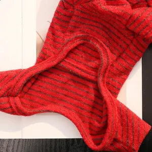 Red striped pet onesie with belly protection and customizable cutout design