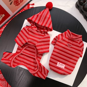 Detail of red and white striped pet hoodies with sweet bear tag and soft plush texture