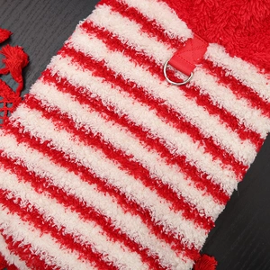 Close-up of red and white striped pet hoodie with soft plush fabric and metal D-ring buckle