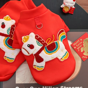 Detail of red pet velvet vest with horse embroidery and metal D-ring for New Year