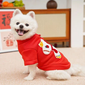 Detailed view of red pet sweatshirt with festive cartoon embroidery on the back