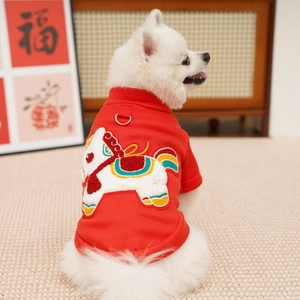 Detail of red festive pet sweater with traditional horse embroidery and lead D-ring