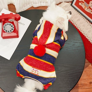 Detail of red and blue striped pet hoodie with plush pom-pom and Sweet Bear patch