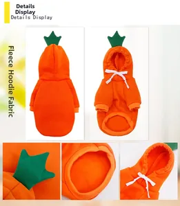 Détails du sweat à capuche carotte montrant la texture en polaire et le motif de feuilles