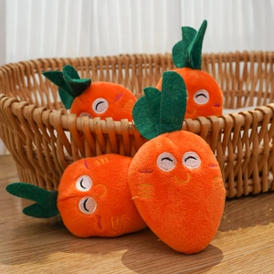 Set of 4 plush squeaky carrot pet toys with cute embroidery in a rustic basket
