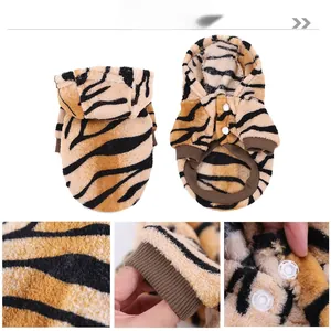 Detailed views of tiger print flannel dog hoodie with snap buttons and ribbed cuffs