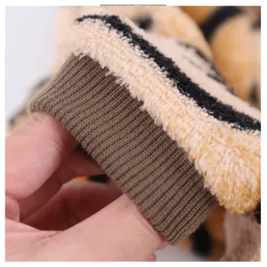 Detailed view of leopard print plush pet clothes with brown elastic ribbed cuffs