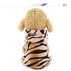 Detail of tiger pattern flannel pet hoodie showing soft texture and hooded design