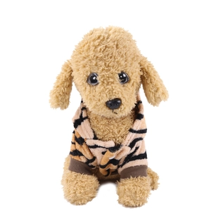 Detailed view of high-density tiger pattern flannel fabric and white button on pet hoodie