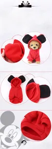 Detail of red fleece pet hoodie showing 3D tailoring, ribbed cuffs, and cute black ears
