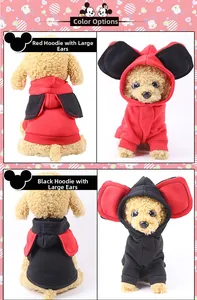 Detail view of red and black pet hoodies featuring playful cartoon big ear hood designs