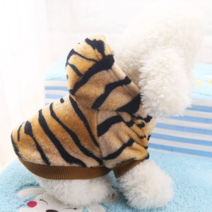 Tiger pattern flannel hoodie for pets featuring warm plush fabric and ribbed cuffs