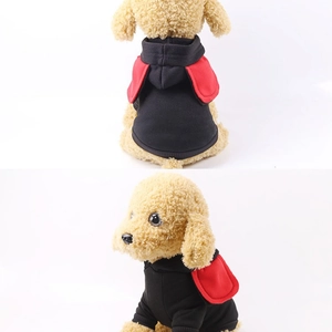 Pet hoodie with red hood ears and black body, shown on a model from back and side view