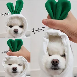 Detail of pet hoodie featuring a creative white radish design and green leaf top
