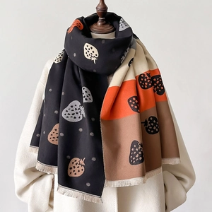 Patchwork strawberry pattern knit scarf with fringe in black and orange tones