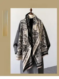Detail of Korean style warm thick shawl scarf with vintage prints and letter branding