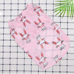 Detail of pink pet vest featuring cute rabbit prints and breathable fabric edge