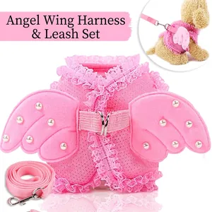 Pink pearl angel wing dog harness set with breathable mesh and lace trim on white background