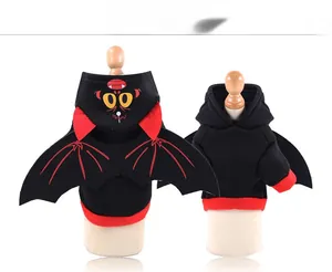 Front and back view of a black bat-themed pet hoodie with red wings and cartoon hood ears