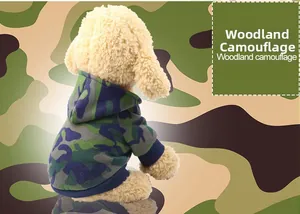 Detail of woodland camouflage hooded pet sweatshirt with navy ribbed cuffs on a dog