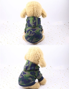 Detail of camouflage pet hoodie featuring ribbed cuffs and a soft cotton blend fabric
