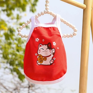 Detail of red breathable mesh pet vest with Maneki-neko print and pearl hanger display