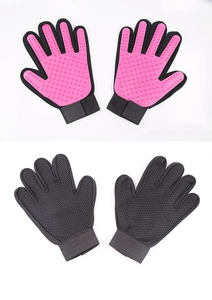 Detailed view of pink silicone massage grooming glove with breathable black mesh backing