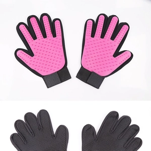 Pink and black pet grooming massage gloves with soft silicone bristles for cats and dogs