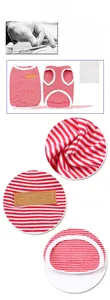 Macro shot of breathable red striped cotton dog vest with brown classic leather patch detail