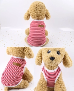 Detailed view of red and white striped pet vest with classic leather patch on back