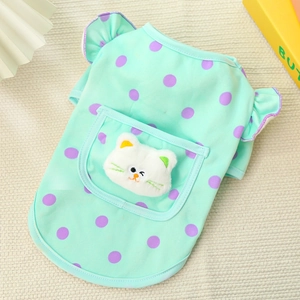 Detail of mint green dog vest with purple dots and cute plush cat applique decor