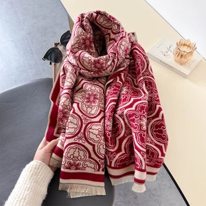 Châle élégant en maille rouge et blanc avec motifs floraux et pompons à franges