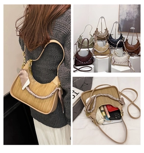 Detail view of woven leather shoulder bag showing multi-color options and internal capacity