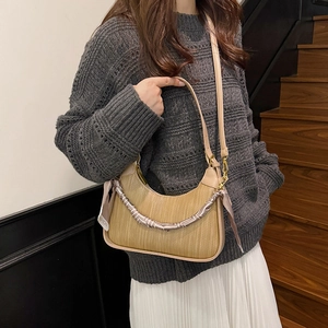Fashionable woven hobo shoulder bag with geometric scarf detail and chain strap