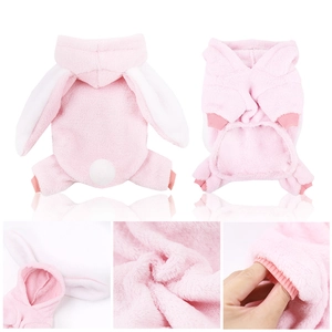 Detail of pink rabbit-themed pet fleece showing long bunny ears and soft texture