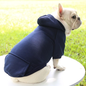 Detail of navy blue pet hoodie with back pocket on a French Bulldog model