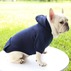 Detail of navy blue pet hoodie with functional pocket and ribbed cuffs for small dogs
